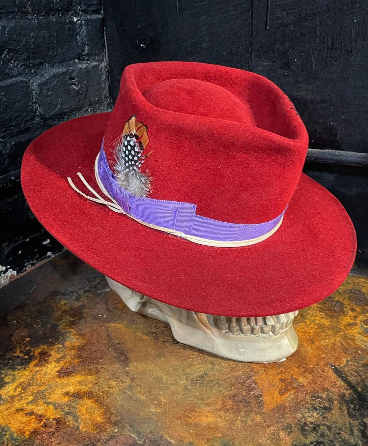 A fedora with a bow  1 day hat workshop