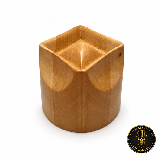 Diamond crown wooden hat block, front three-quarter view