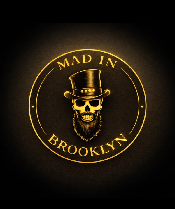 Mad in Brooklyn circular black and gold logo