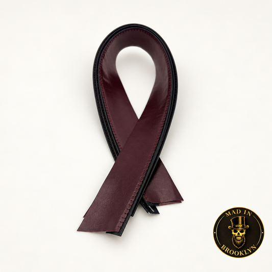 Maroon lamb leather hat sweatband with black stitched edge