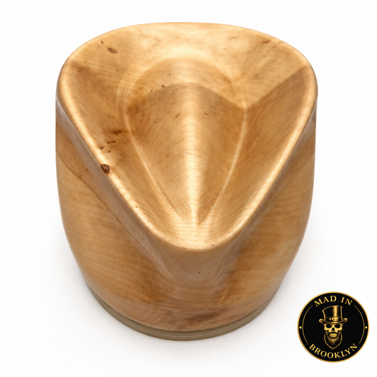 Teardrop crown wooden hat block, front three-quarter view